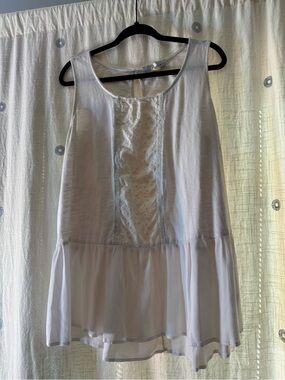 Lightweight White Sleeveless Peplum Top